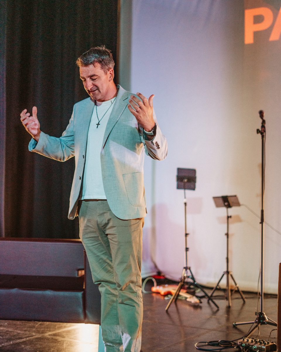 A speaker sharing on stage