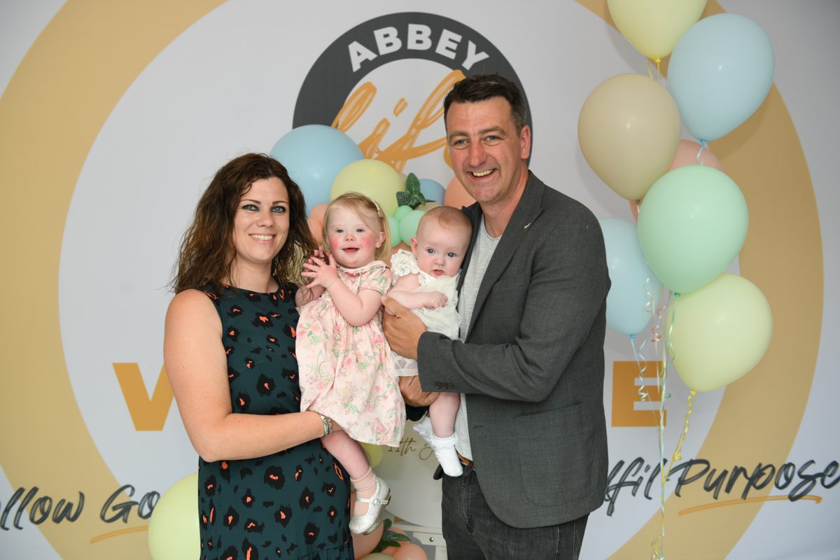 Sam and Rachel Wells with their children